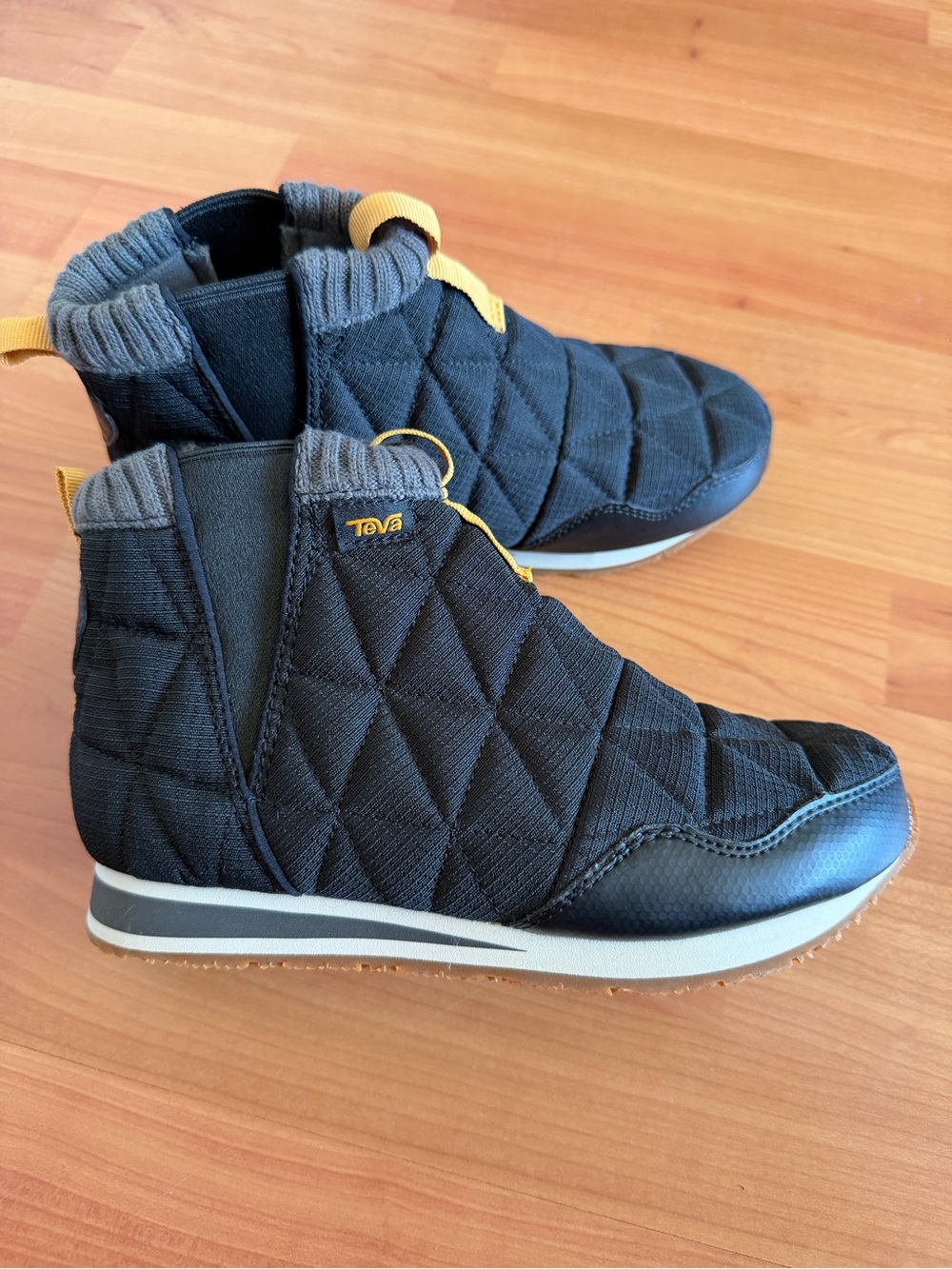 Teva Black Quilted Ankle Boots with Yellow Trim